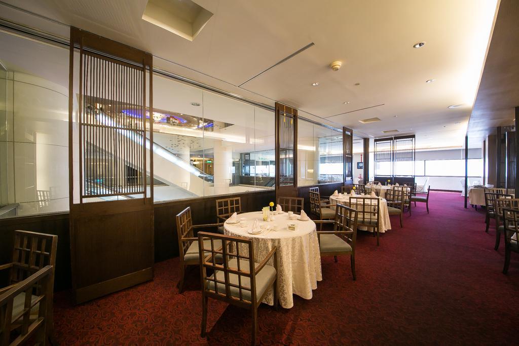 Evergreen Plaza Hotel - Tainan Bagian luar foto The interior of the restaurant